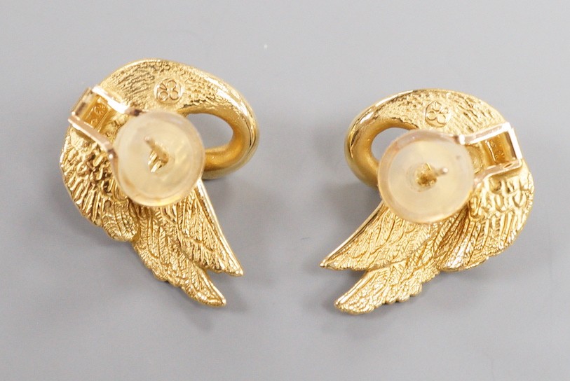 A modern pair of hollow 750 yellow metal earrings, modelled as swans, 26mm, gross weight 7.4 grams.